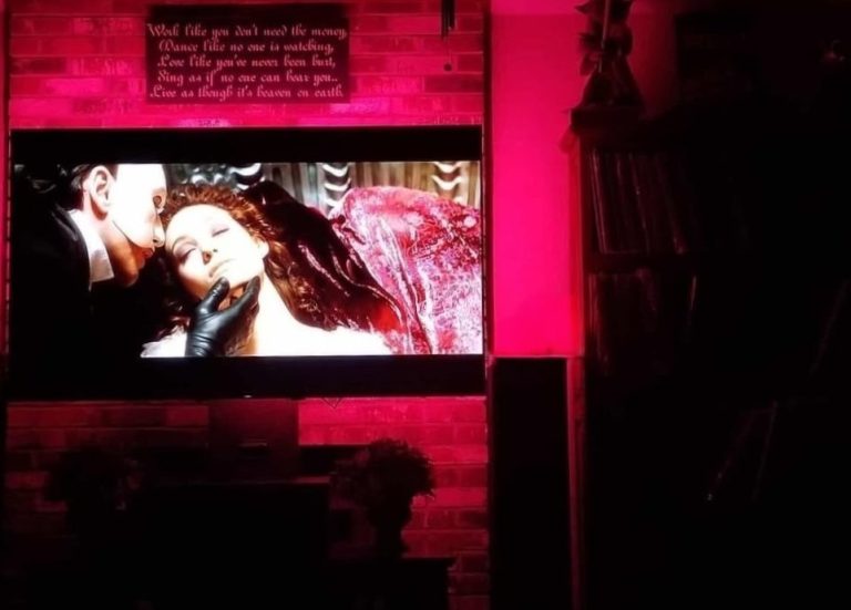 Home Theater Installation With Smart Lighting Home Theater Setup with Pink Background Lighting Matching Pink on the Screen